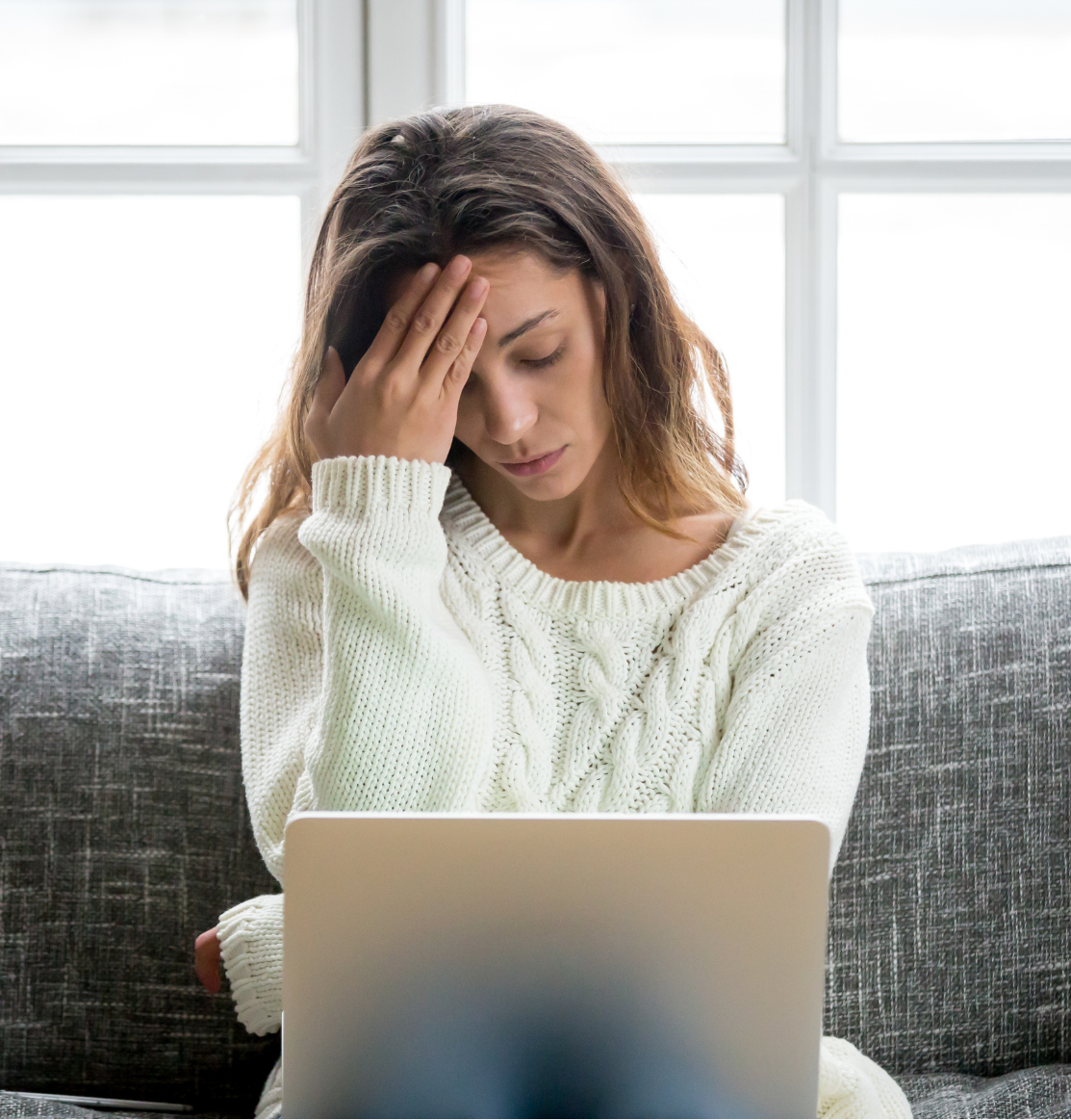 A woman appears stressed while looking at her laptop. This could represent the stress of GAD that anxiety treatment in American Fork, UT can offer. Learn more about anxiety therapists American Fork UT by searching for "therapist american fork" today.