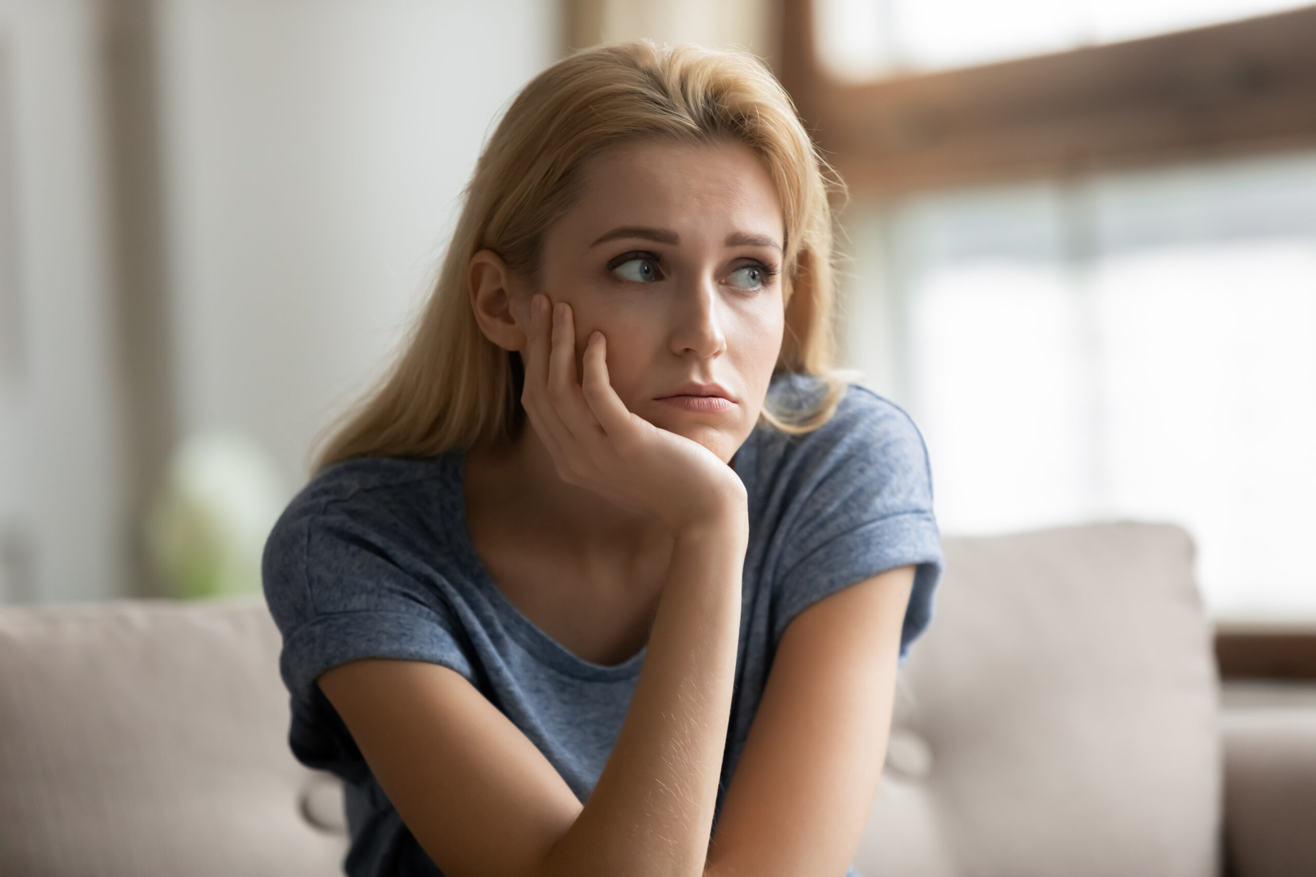 A teen looks off into the distance with a concerned expression. This could represent the stress of mothers day with complicated relationships. Learn how depression counseling in American Fork, UT can offer support by searching for anxiety and depression therapists in American Fork. Search for Utah family therapy for more support.