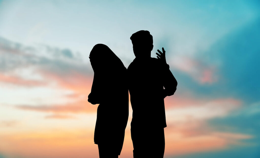 A couple silhouette. Learn how to transition from the only religion you've known with a faith deconstruction therapist in American Fork, UT. Contact us today to begin.
